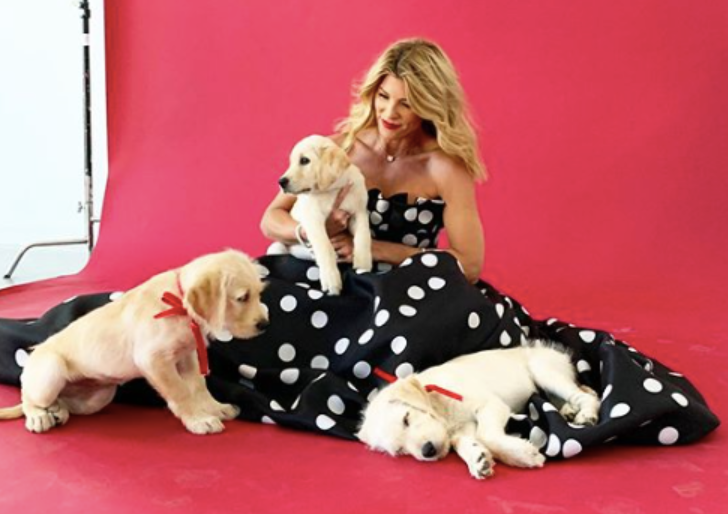 A picture of @livingwithlandyn from Instagram with three dogs