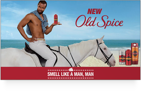 Old Spice man sitting on white horse shirtless